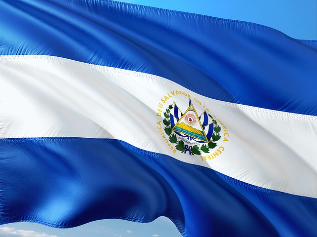 The flag of El Salvador flying in the wind