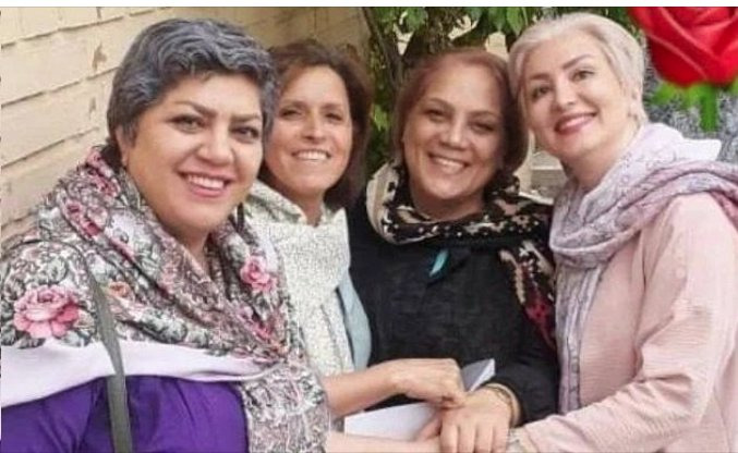 This image shows four Iranian WHRDs posing for a selfie.