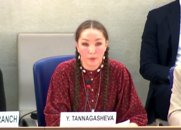 This image shows Yana Tannagasheva speaking before the Human Rights Council