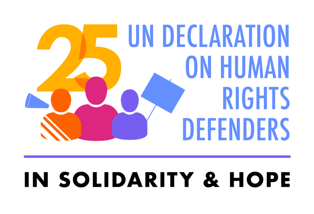 The image featured is the logo created by the Special Rapporteur for the 25th anniversary of the UN Declaration on human rights defenders. In the top left corner is "25" in an orangy yellow thick type. The right part of the logo reads "UN Declaration on human rights defenders" in light blue type. Underneath the number 25 are three icons representing defenders holding a sign and a megaphone. There are coloured in orange, bright pink and purple. Underneath it all is a tagline reading "In solidarity and hope". 