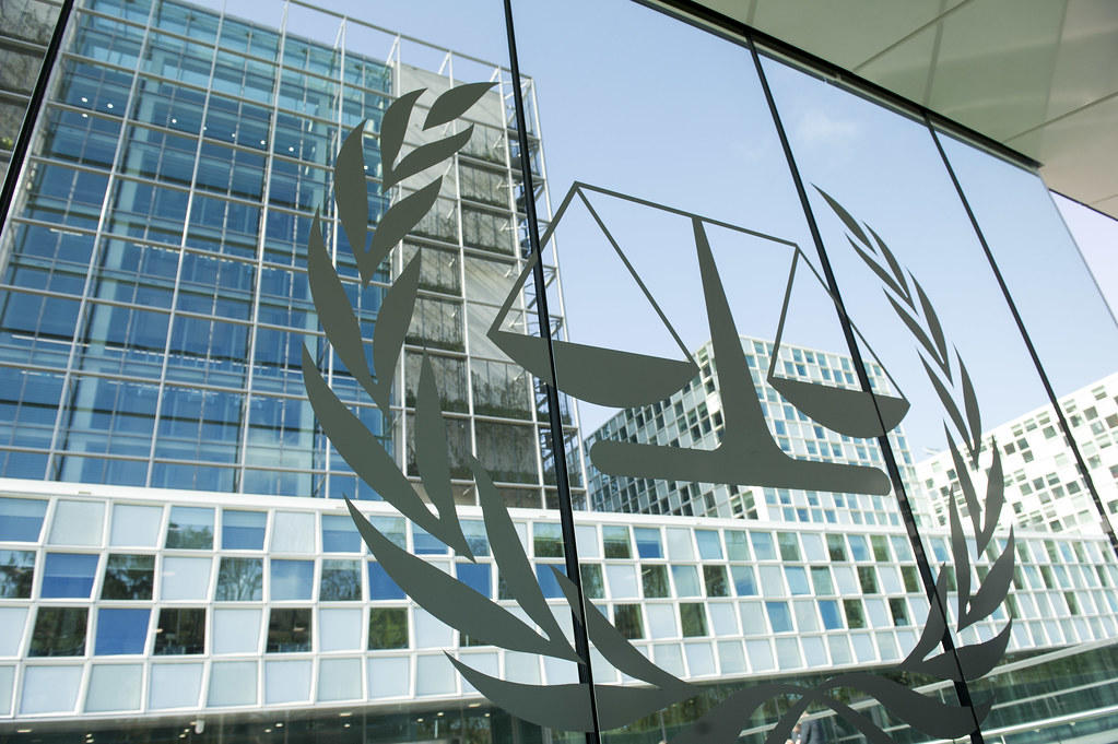 Picture of the glass facade of the headquarters of the International Criminal Court in The Hague, Netherlands