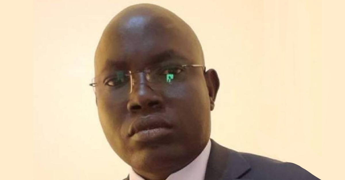 Morris Mabior Awikjok is looking straight into the camera with a serious face.