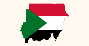 The flag of Sudan in the shape of the country.