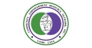 Logo of the Community Empowerment Resource Network, Inc. (CERNET) based in Cebu City, Philippines. The logo is circular with a green and purple colour scheme. The outer ring features the organisation's name in black text, with 'Cebu City' at the bottom. Inside, two overlapping circles—one green on the left and one purple on the right—form a Venn diagram shape with a white oval in the center. Within the oval are abstract line drawings of faces, symbolising rural and marginalised communities in the Philippines.