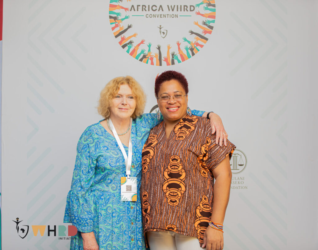 UN Special Rapporteur on human rights defenders Mary Lawlor standing with woman human rights defender Mary Pais Da Silva during the WHRD Convention in Accra, Ghana.