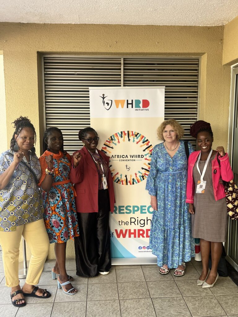 UN Special Rapporteur on human rights defenders Mary Lawlor standing with four women human rights defenders during the WHRD Convention in Accra, Ghana.