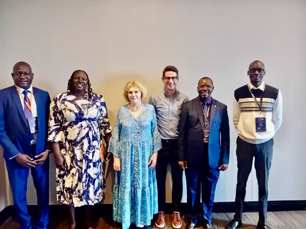 UN Special Rapporteur on Human Rights defenders Mary Lawlor and her Senior Advisor Ed O'Donovan are standing amongst members of the South Sudan HRD Network during an event in South Africa. 