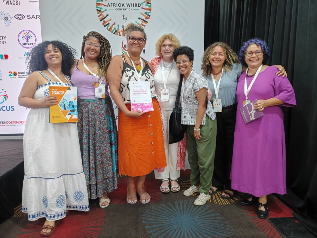 UN Special Rapporteur on human rights defenders Mary Lawlor standing with six women human rights defenders from Brazil during the WHRD Convention in Accra, Ghana.