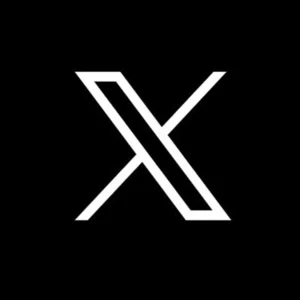 The logo of X Copr, a white 'X' on a black background