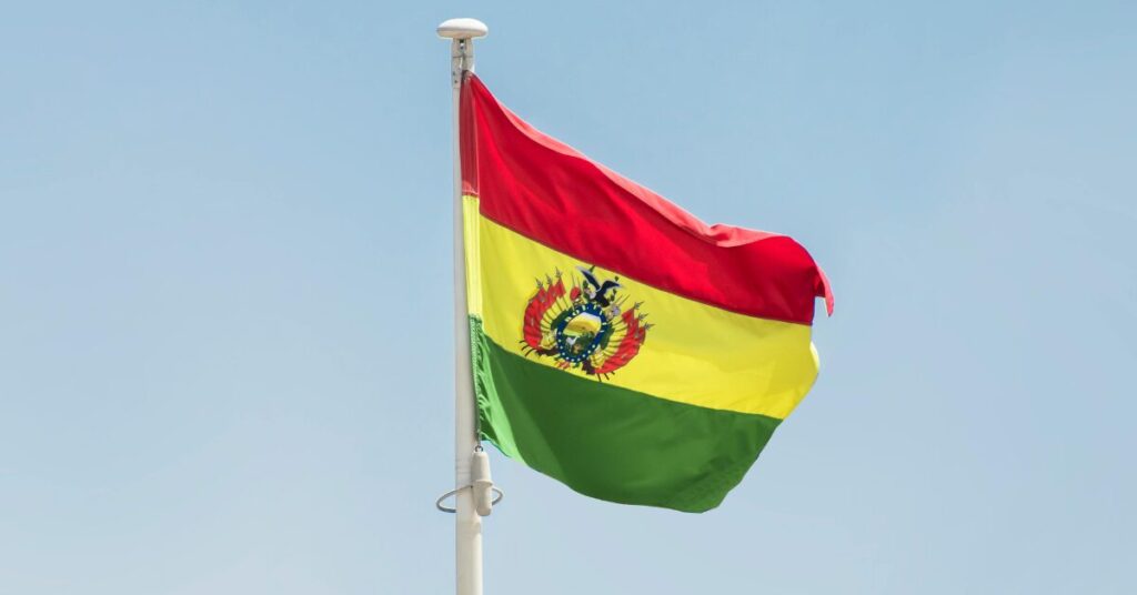 The flag of Bolivia flying in the wind