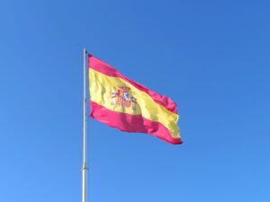 Spanish Flag against Blue Sky